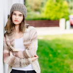 Stylish woman wearing a cardigan with a modern twist